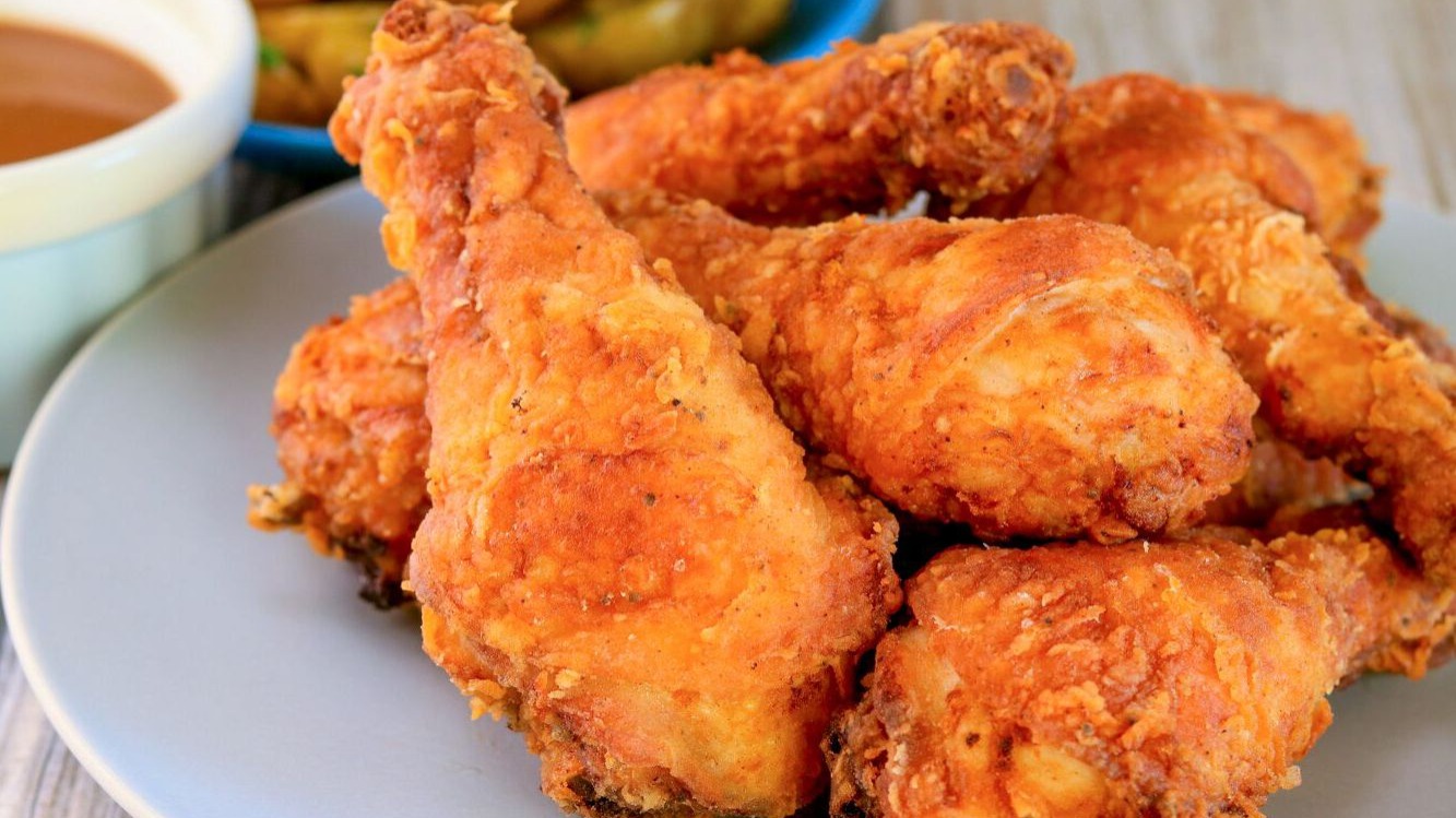 Southern fried chicken, also known simply as fried chicken, is a dish consisting of chicken pieces that have been coated with seasoned ...